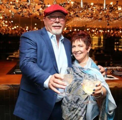 Christine Arians with her husband Bruce Arians in an event.